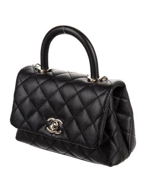 mini coco handle bag chanel|chanel coco handbag price uk.